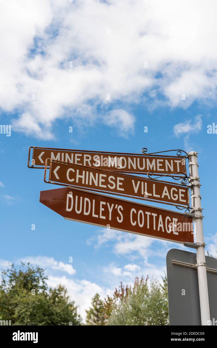 A direction sign in Arrowtown New Zealand giving dorections to tourist attractions Stock Photo