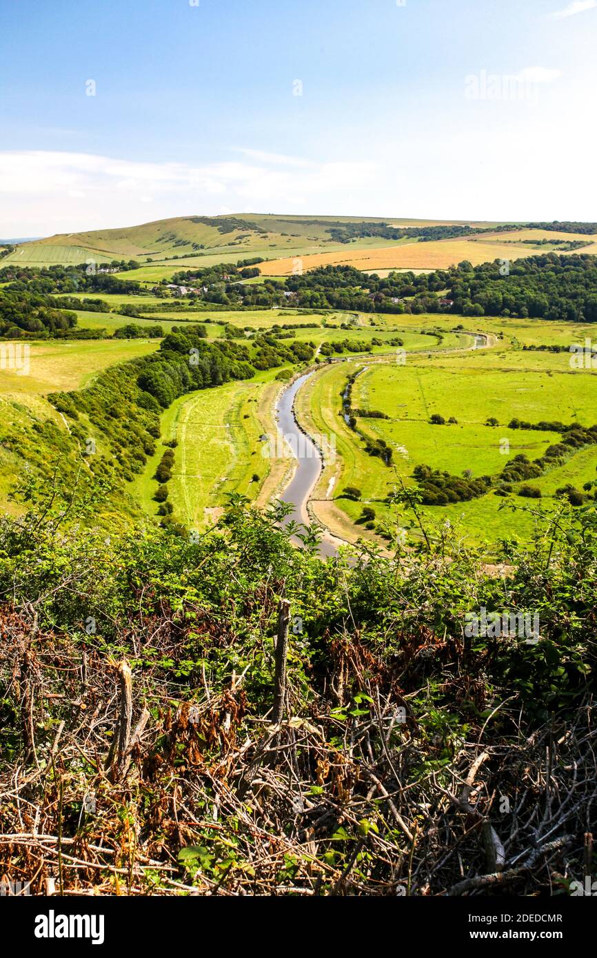 Sussex's only undeveloped river estuary  contains  the south coast's most intriguing landscapes, protected by the NT, Country Park and SSSI systems. Stock Photo