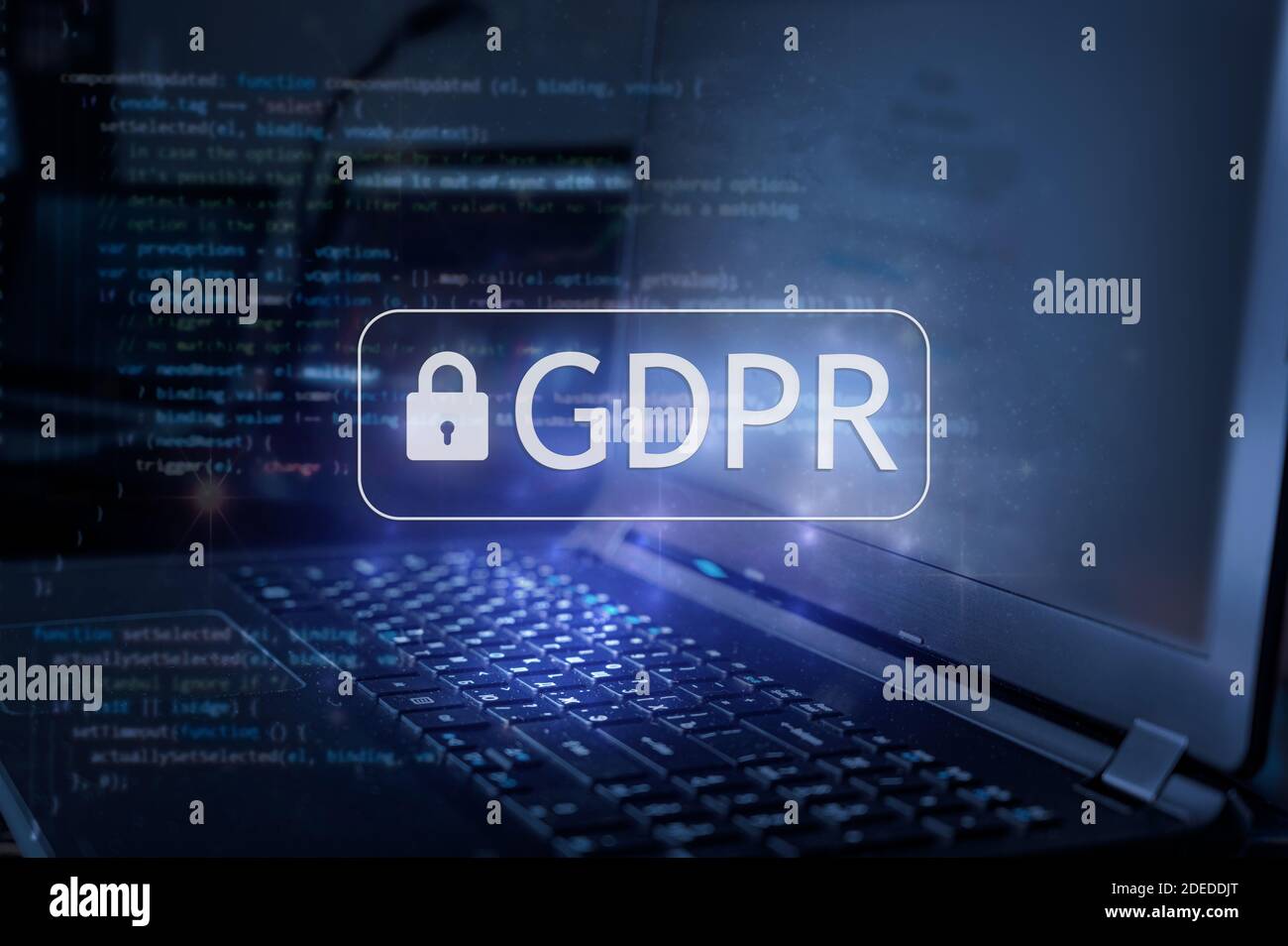 GDPR inscription against laptop and code background. Data protection concept. Stock Photo