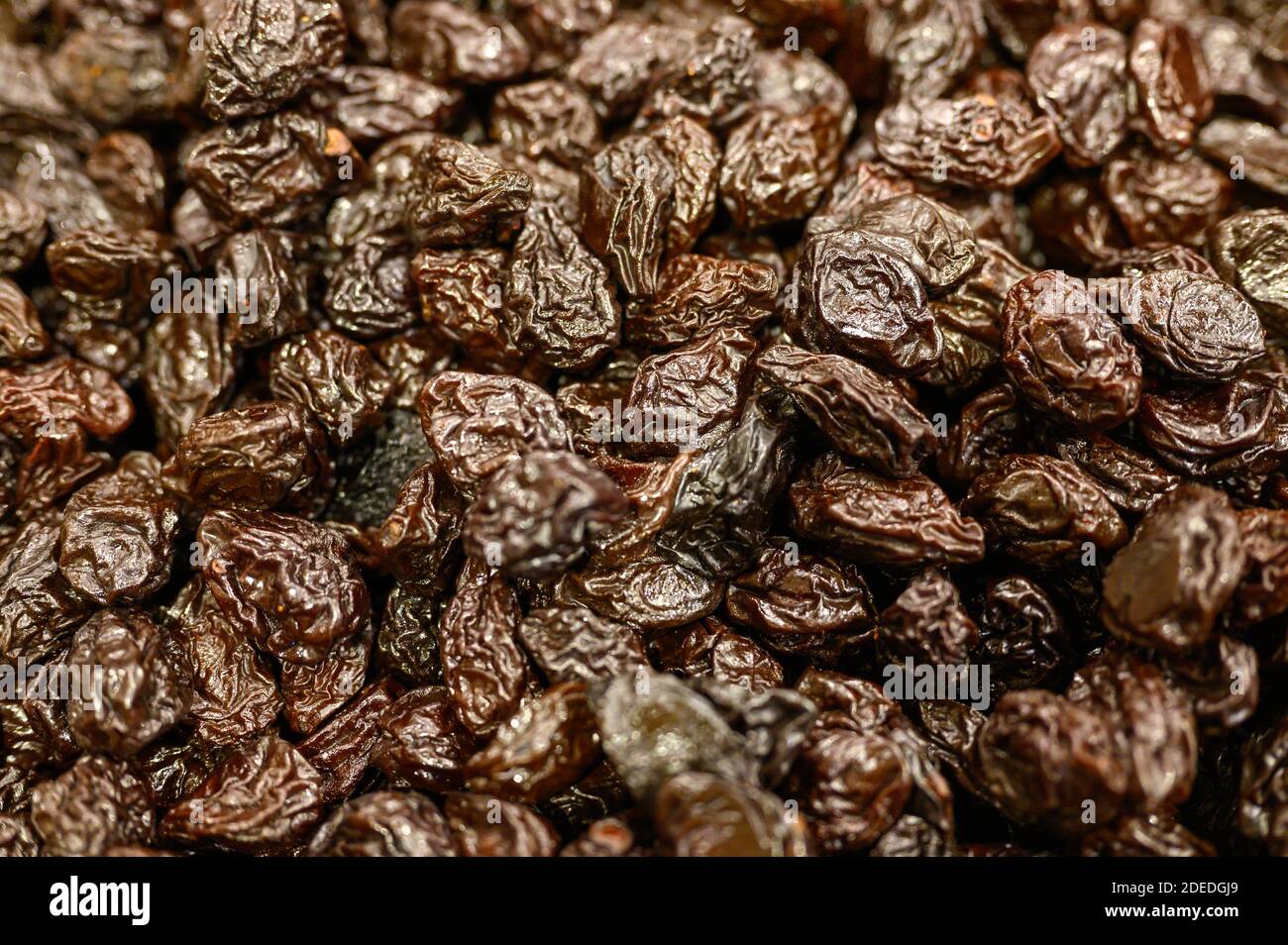 prunes a pile of dried fruits as a background Stock Photo