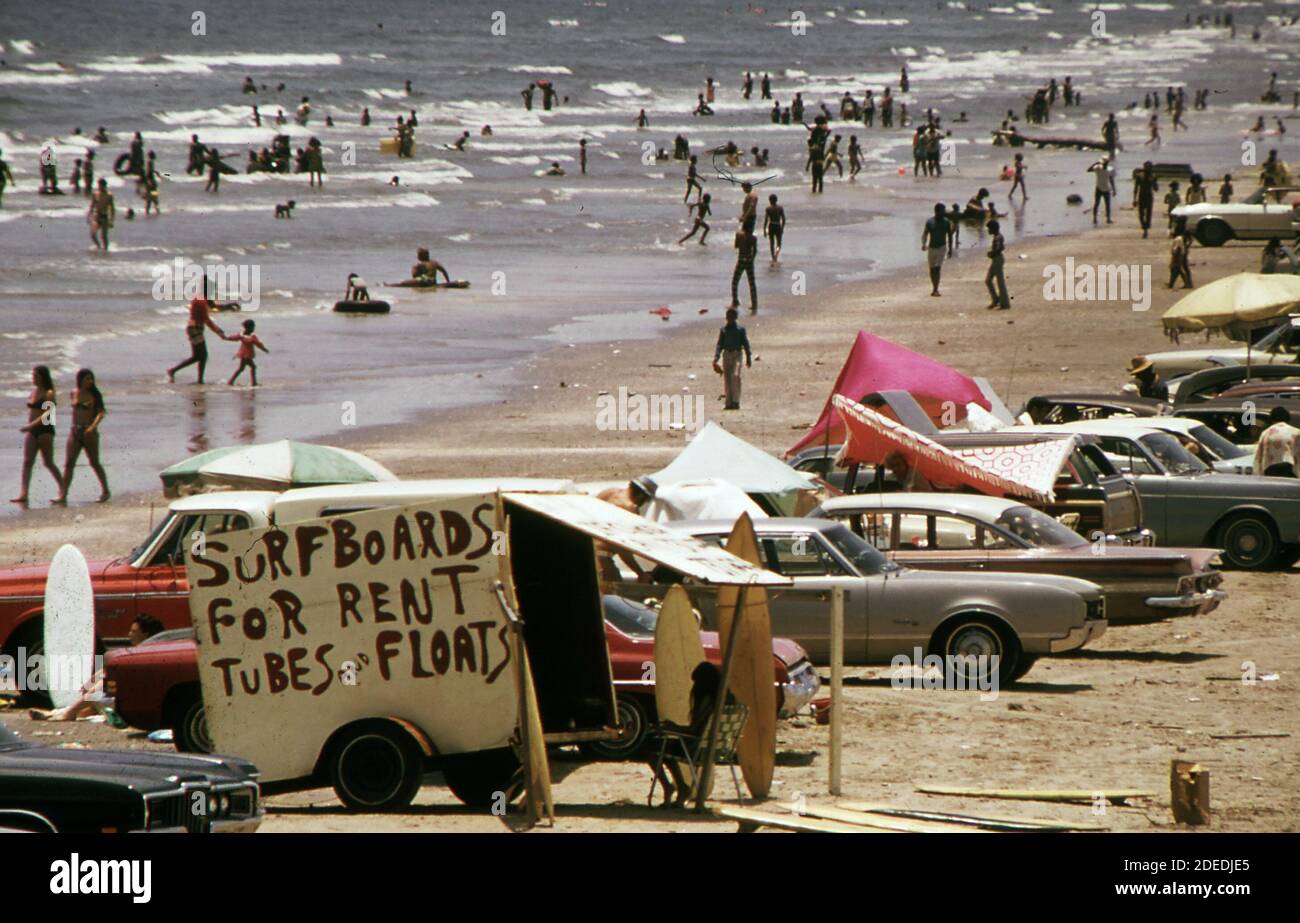 1970s Photo (1973) -   Galveston's West Beach on the Gulf of Mexico draws huge crowds--and provides the enterprising a chance to turn a dollar Stock Photo