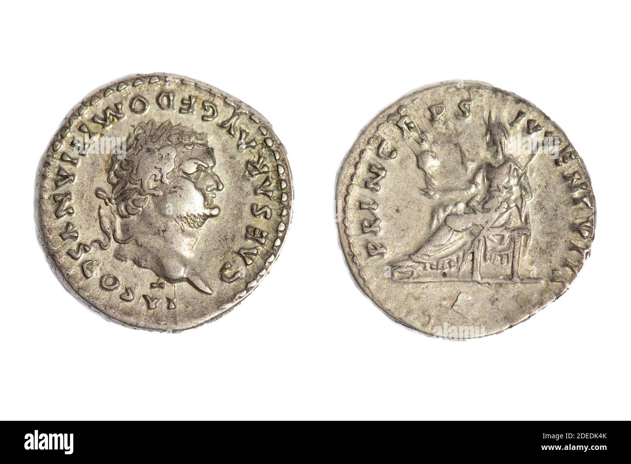 Old Ancient vintage coin coins AR Silver Denarius Emperor Domitian Caesar (reverse side) Goddess of Vesta on a throne. Coin date  79 AD Stock Photo