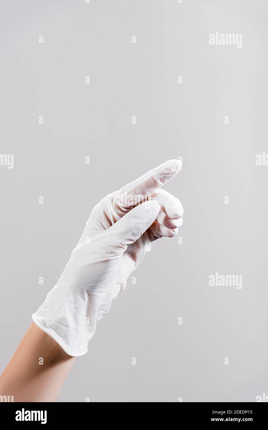 Hand with latex glove isolated hi-res stock photography and images - Alamy