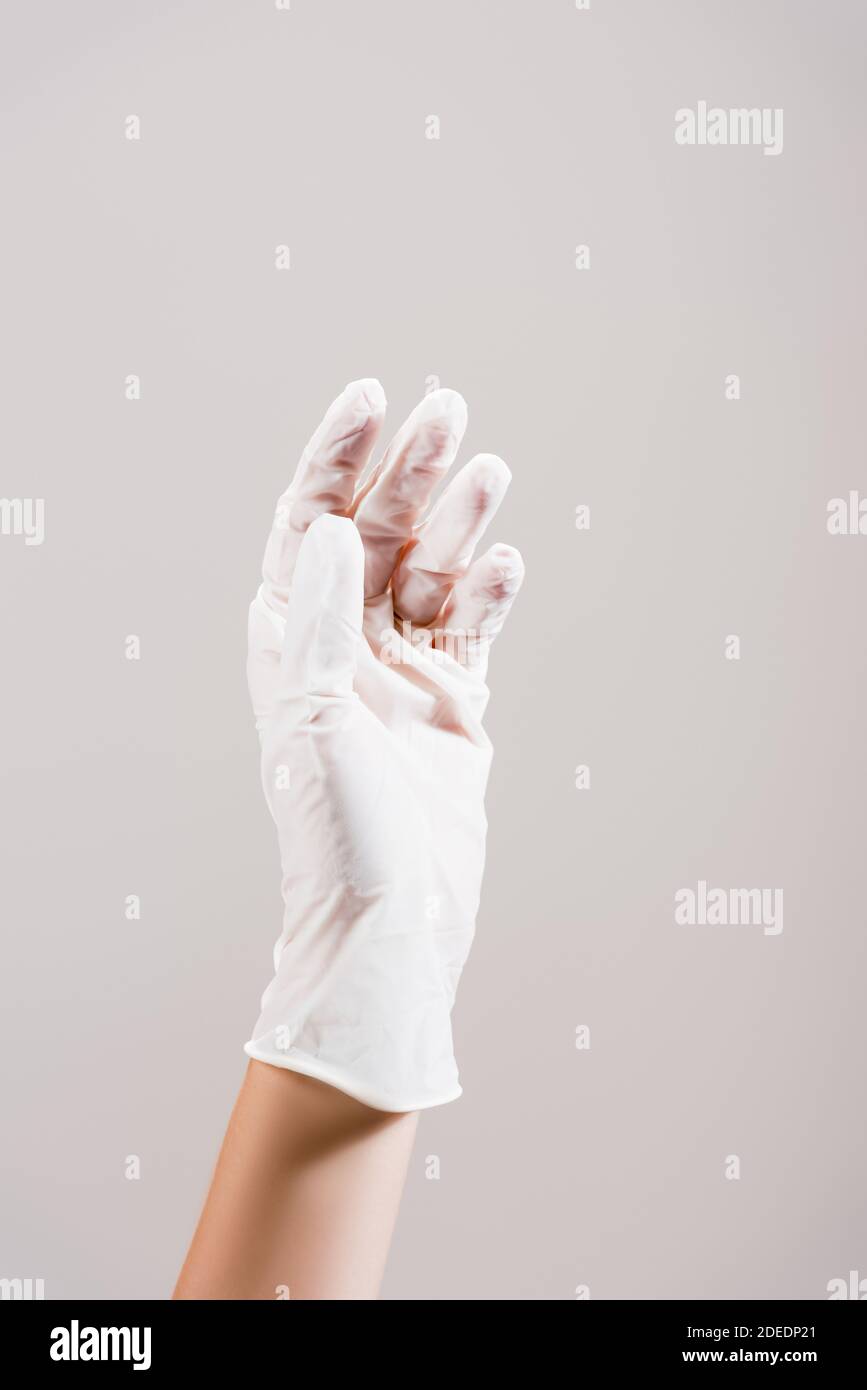 Hand in latex glove hi-res stock photography and images - Alamy