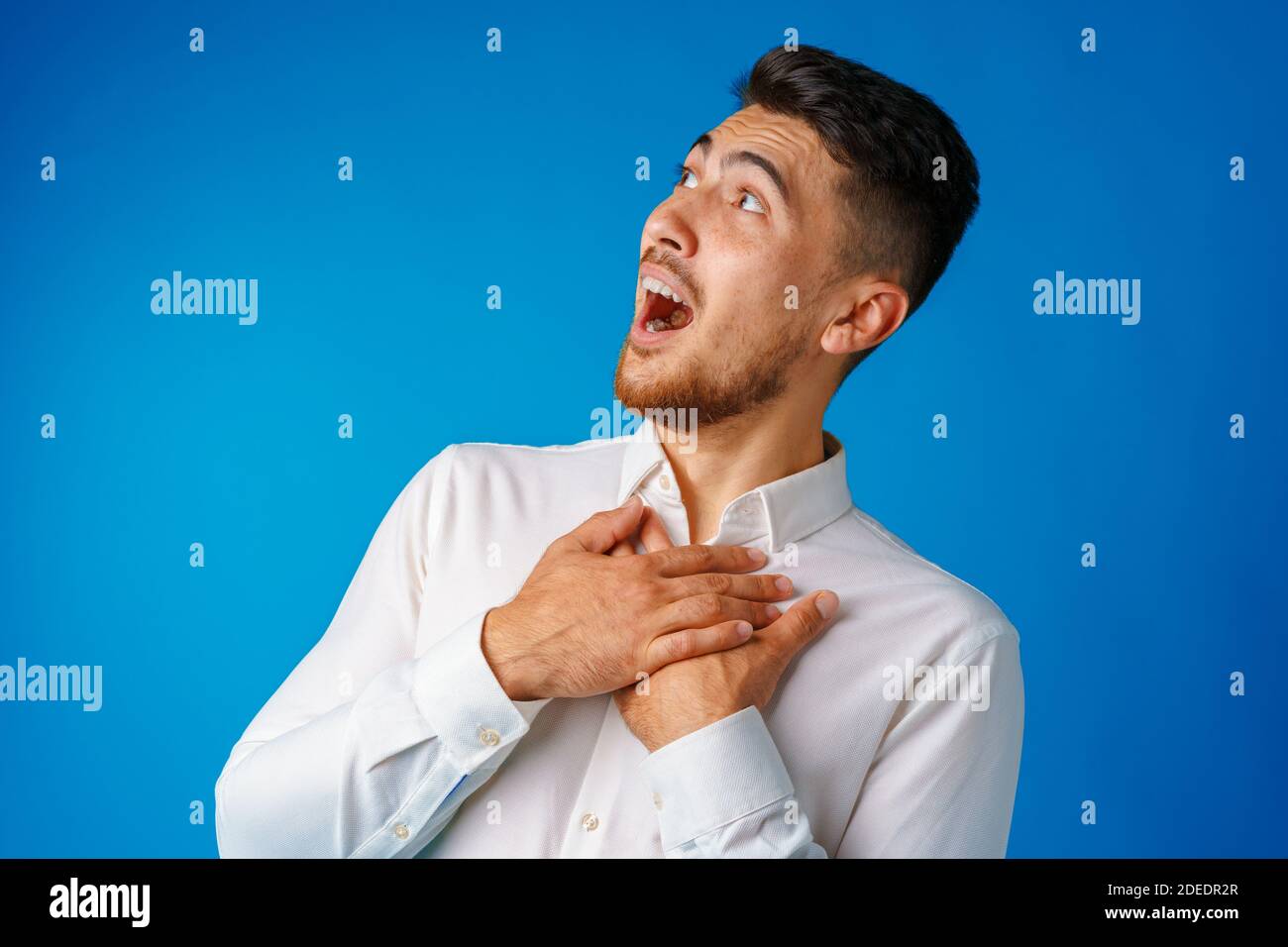 Amazed confused young man hi-res stock photography and images - Alamy
