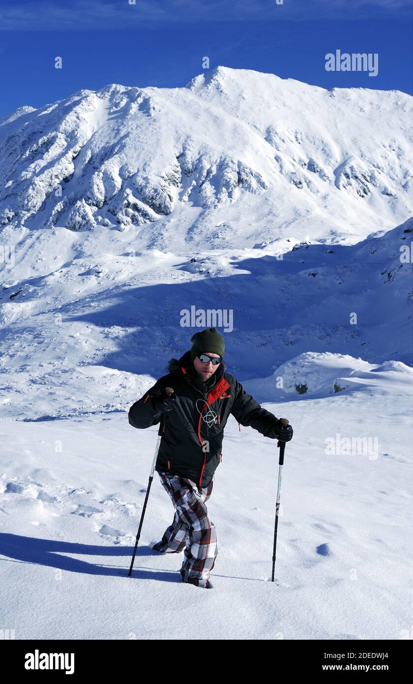 Trekking in harsh winter condition. Winter alpine landscape Stock Photo