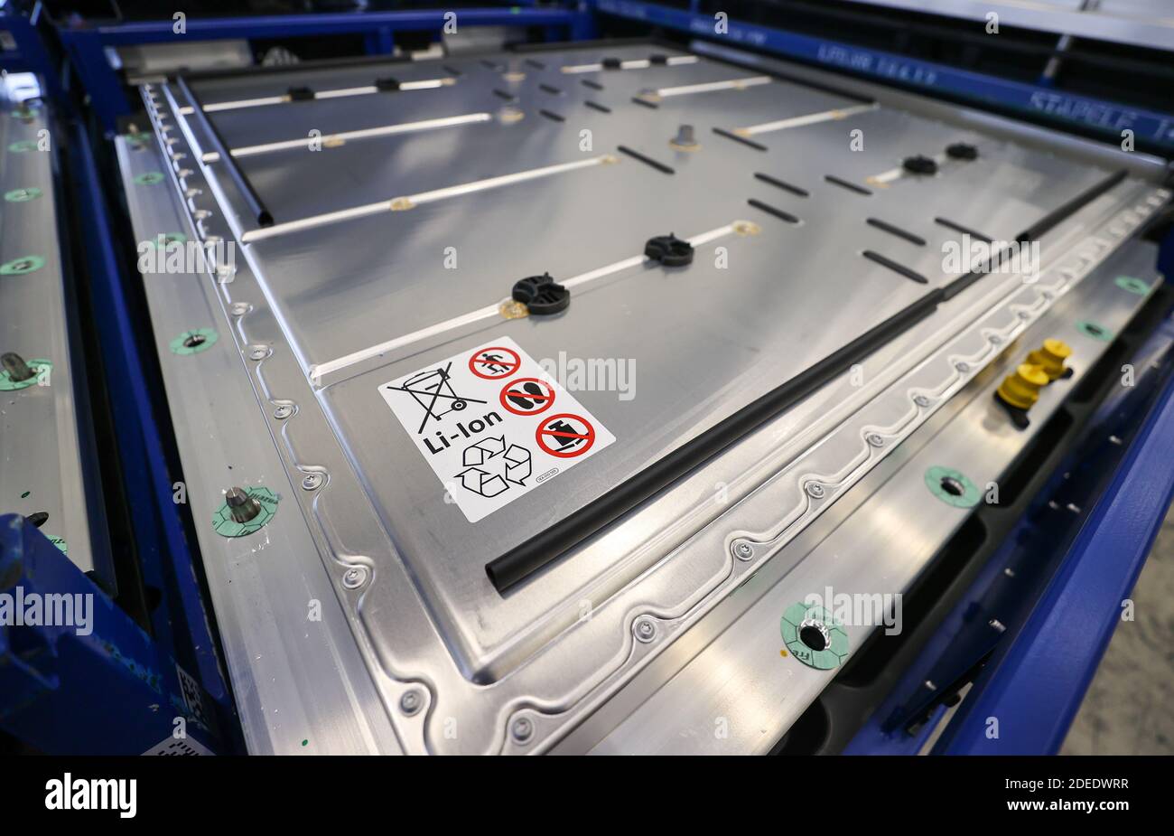 30 November 2020, Saxony, Zwickau: A battery for the VW ID.3 is stored in  the battery warehouse at the VW factory in Zwickau. A system for unloading  the arriving trains, which was