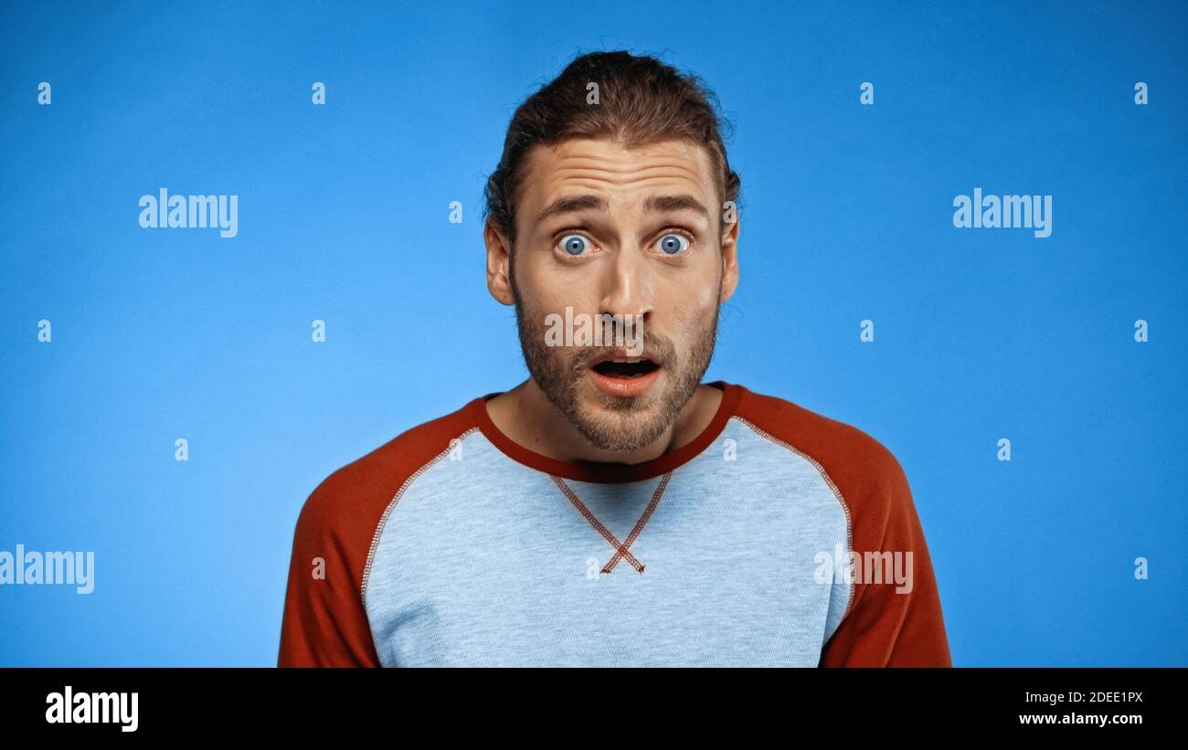 Shocked young bearded man hi-res stock photography and images - Alamy