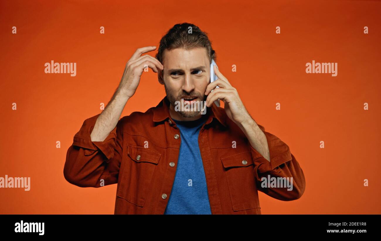 Confused bearded young man hi-res stock photography and images - Alamy