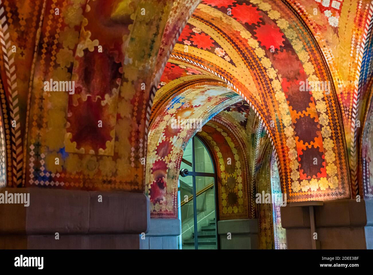 The Giacometti Hall, or Blüemli Hall, is the entrance hall to the Zurich City Police building designed by the Swiss painter Augusto Giacometti in the 1920s. Giacometti Hall in the Zurich Orphanage Building (Waisenhaus-Gebäude), which houses the municipal police station of Zurich, Switzerland Stock Photo