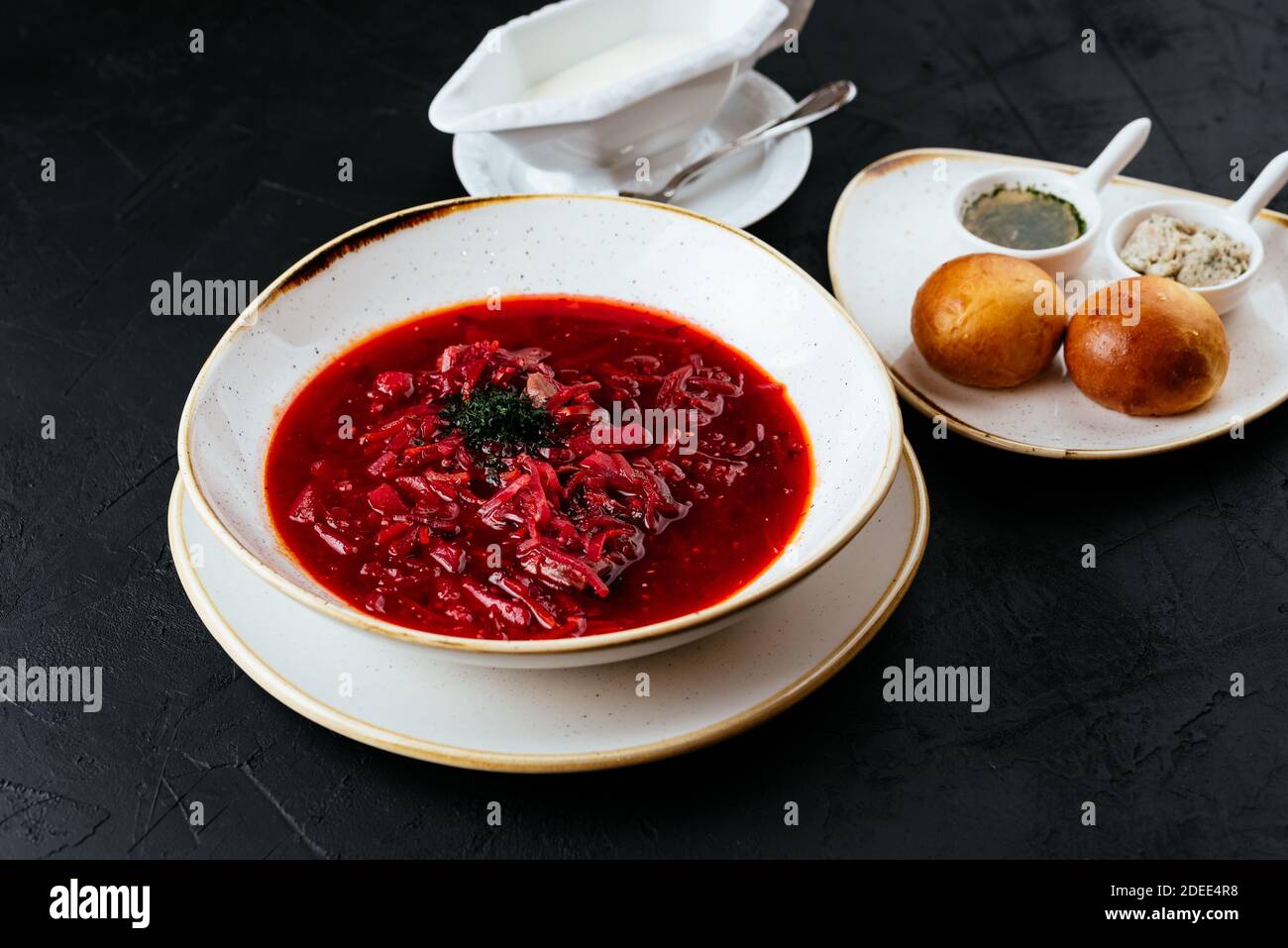 beetroot Russian soup on a textured black background Stock Photo