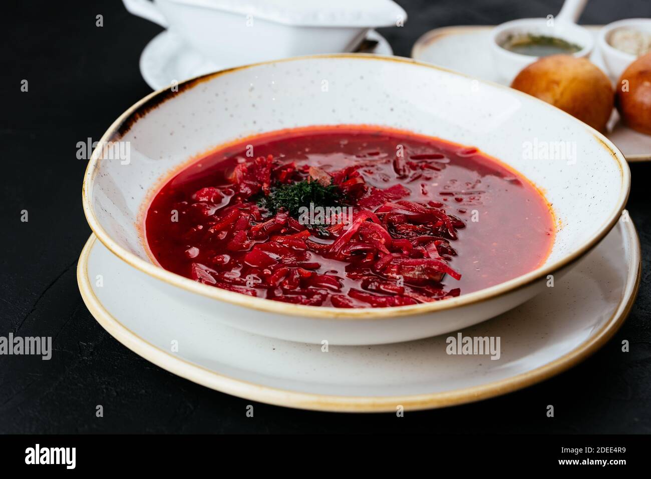beetroot Russian soup on a textured black background Stock Photo