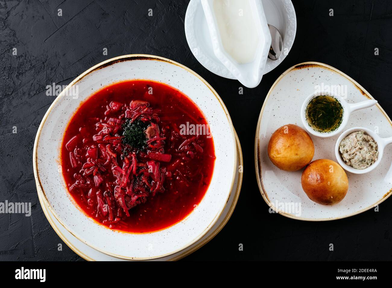 beetroot Russian soup on a textured black background Stock Photo