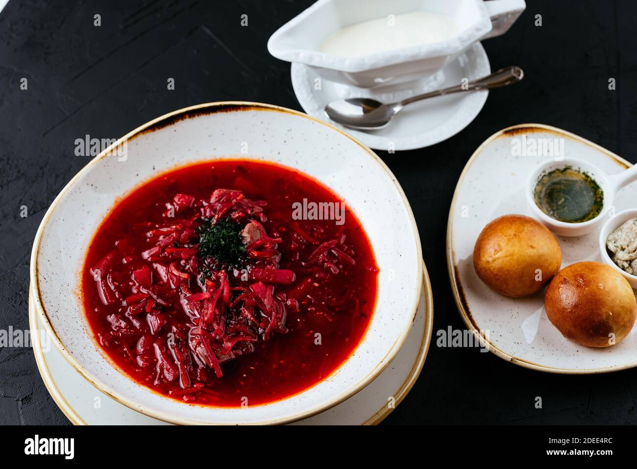 beetroot Russian soup on a textured black background Stock Photo
