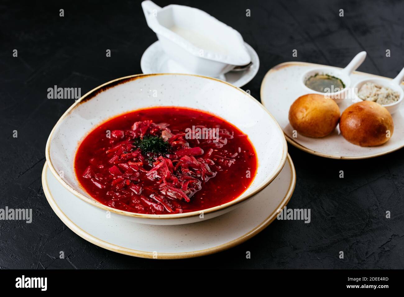 beetroot Russian soup on a textured black background Stock Photo