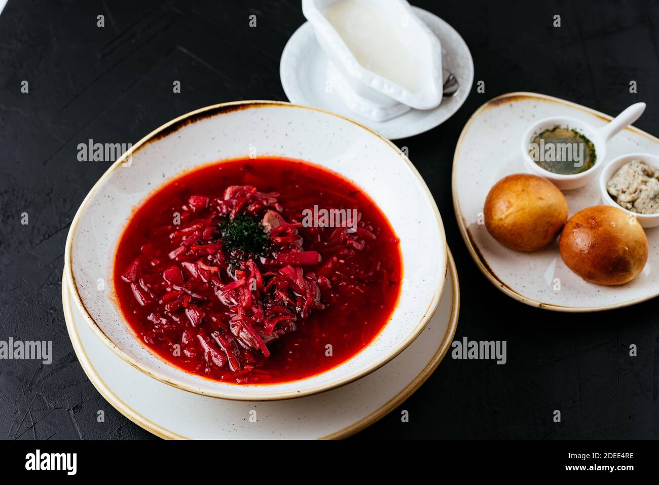 beetroot Russian soup on a textured black background Stock Photo