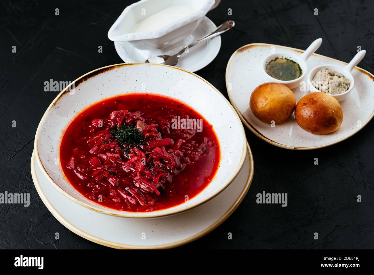 beetroot Russian soup on a textured black background Stock Photo