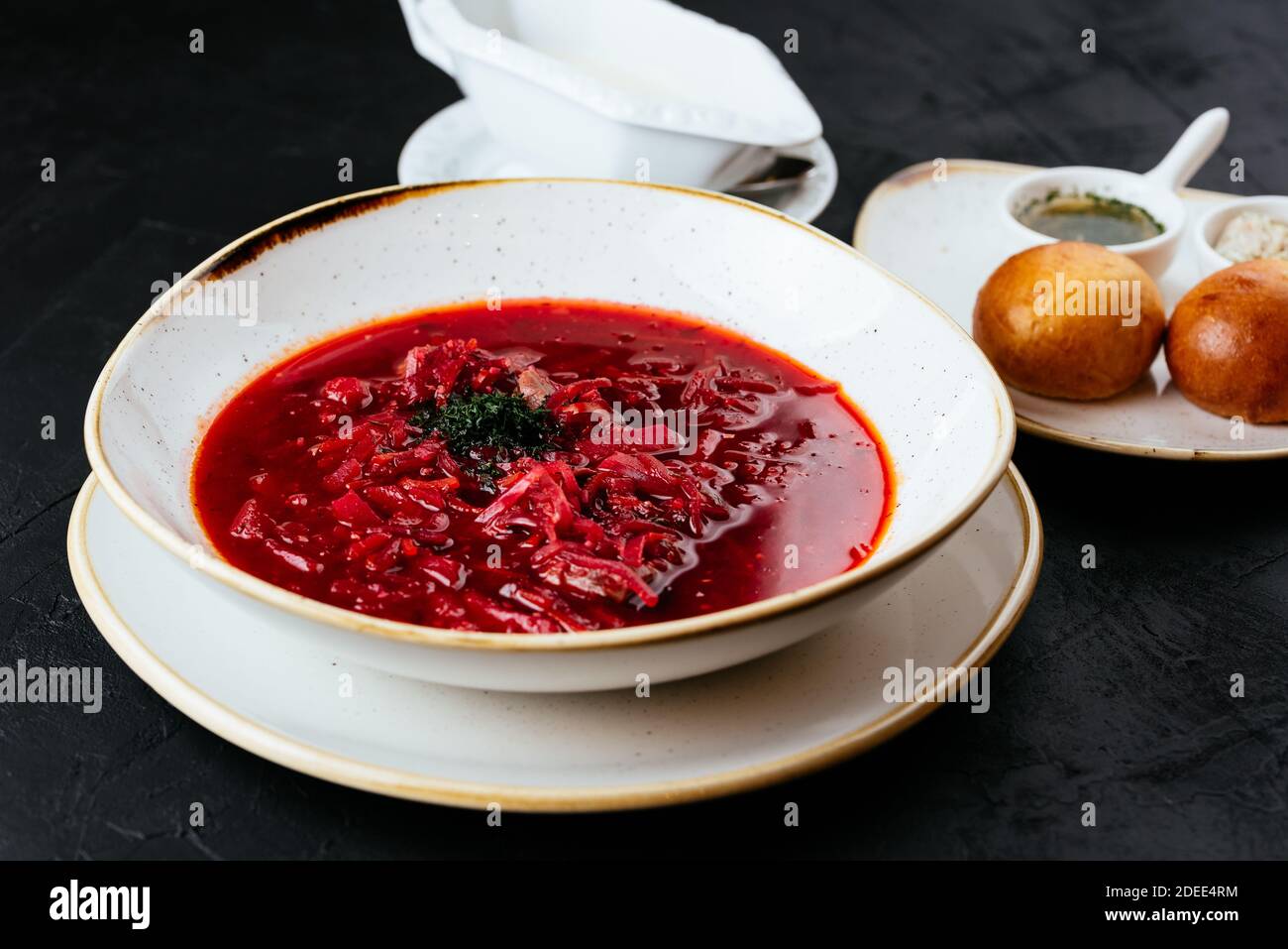 beetroot Russian soup on a textured black background Stock Photo
