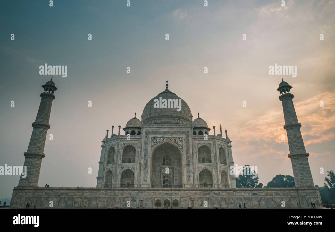 Taj Mahal west face against cloudy sky during sunrise time, Agra, India ...