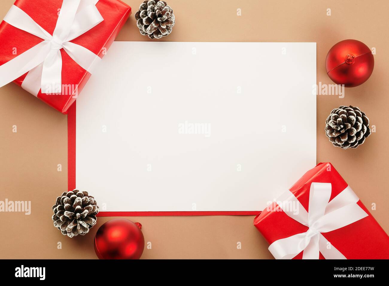 Merry christmas greeting card mockup template with christmas gifts  decorations Stock Photo - Alamy