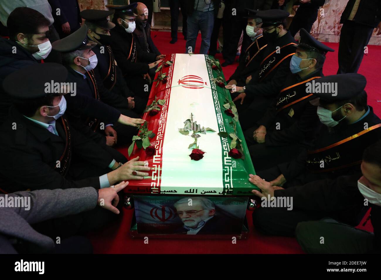 Tehran, Iran. 30th Nov, 2020. A handout photo made available by the Iranian defense ministry office shows soldiers praying next to the coffin of slain Iranian nuclear scientist Mohsen Fakhrizadeh during funeral procession inside the Iranian defense ministry in Tehran, Iran, Monday, November 30. 2020. Iranian officials have blamed Israel for the killing of Fakhrizadeh who led Tehran's disbanded military nuclear program. Photo by Iranian Defense Ministry/UPI Credit: UPI/Alamy Live News Stock Photo