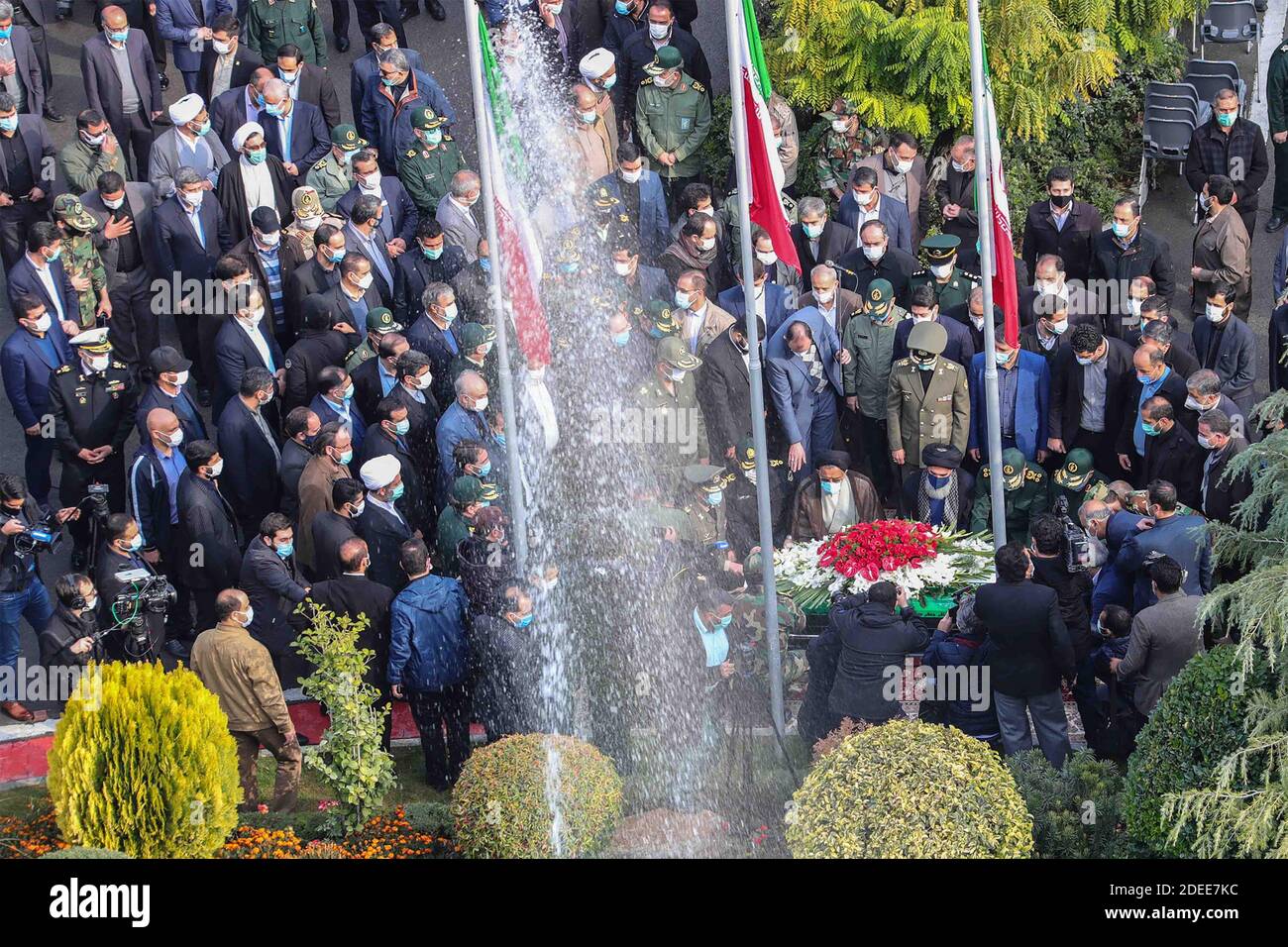 Tehran, Iran. 30th Nov, 2020. A handout photo made available by the Iranian defense ministry office shows mourners at the coffin of slain Iranian nuclear scientist Mohsen Fakhrizadeh during funeral procession inside the Iranian defense ministry in Tehran, Iran, Monday, November 30. 2020. Iranian officials have blamed Israel for the killing of Fakhrizadeh who led Tehran's disbanded military nuclear program. Photo by Iranian Defense Ministry/UPI Credit: UPI/Alamy Live News Stock Photo