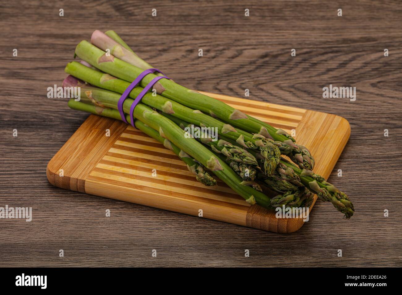 Vegan cuisine - Raw asparagus heap  for cooking Stock Photo