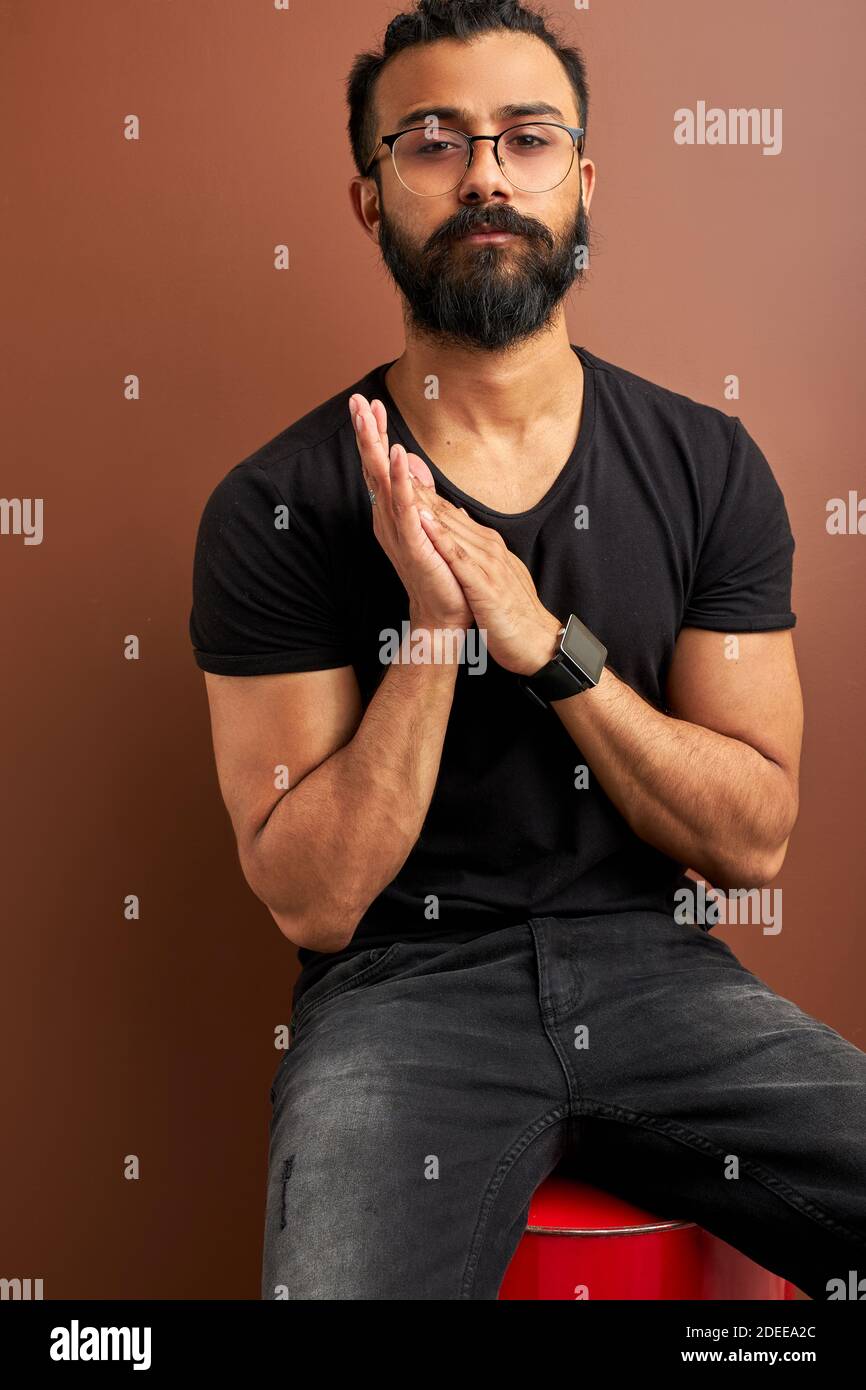 Indian man standing confidently hi-res stock photography and images - Alamy