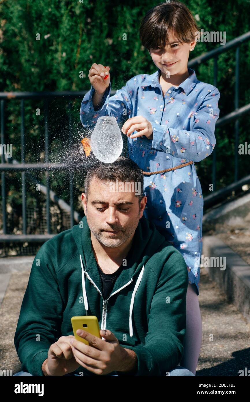 Child blowing up balloon hires stock photography and images Alamy