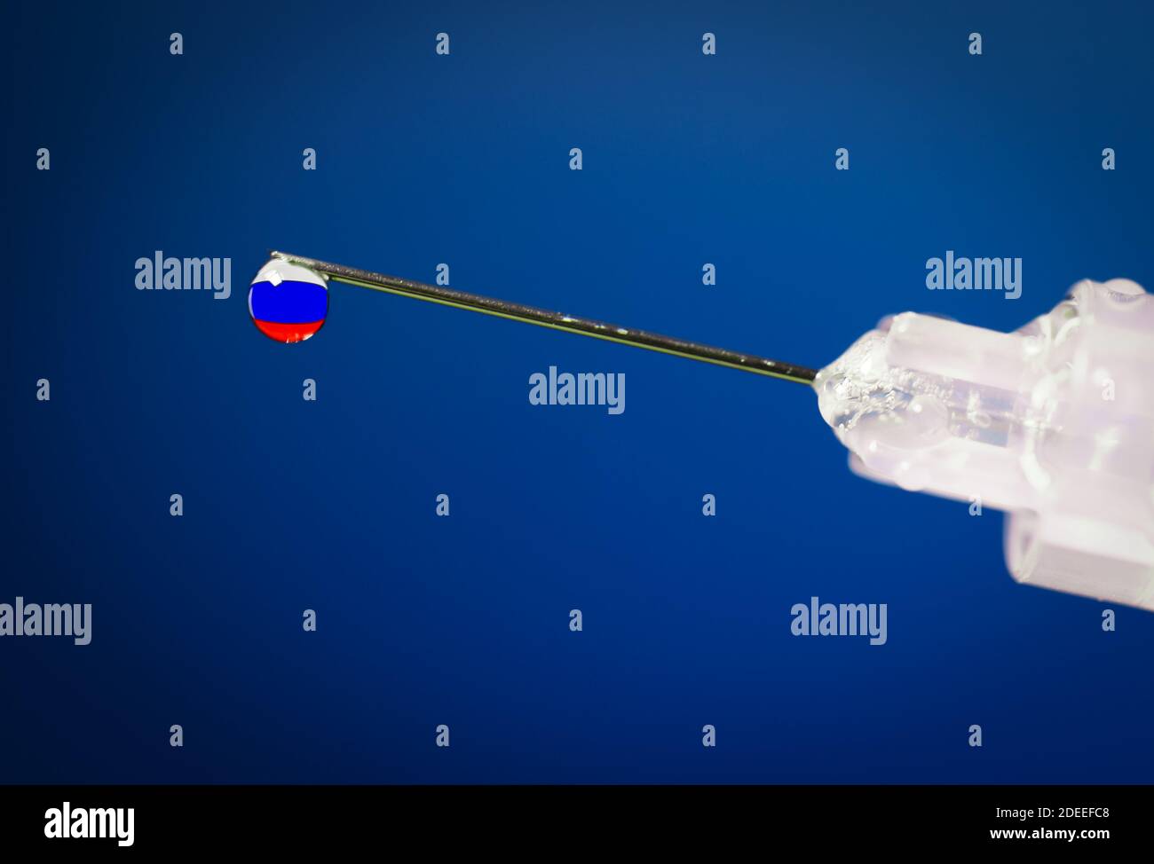Close-up of a drop in a syringe with the flag of Russia inside. Stock Photo