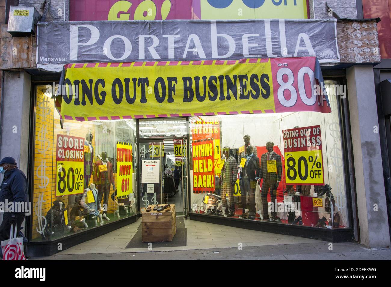 Men's Clothing store going out of business during the Covid-19 pandemic in Brooklyn, New York. Stock Photo