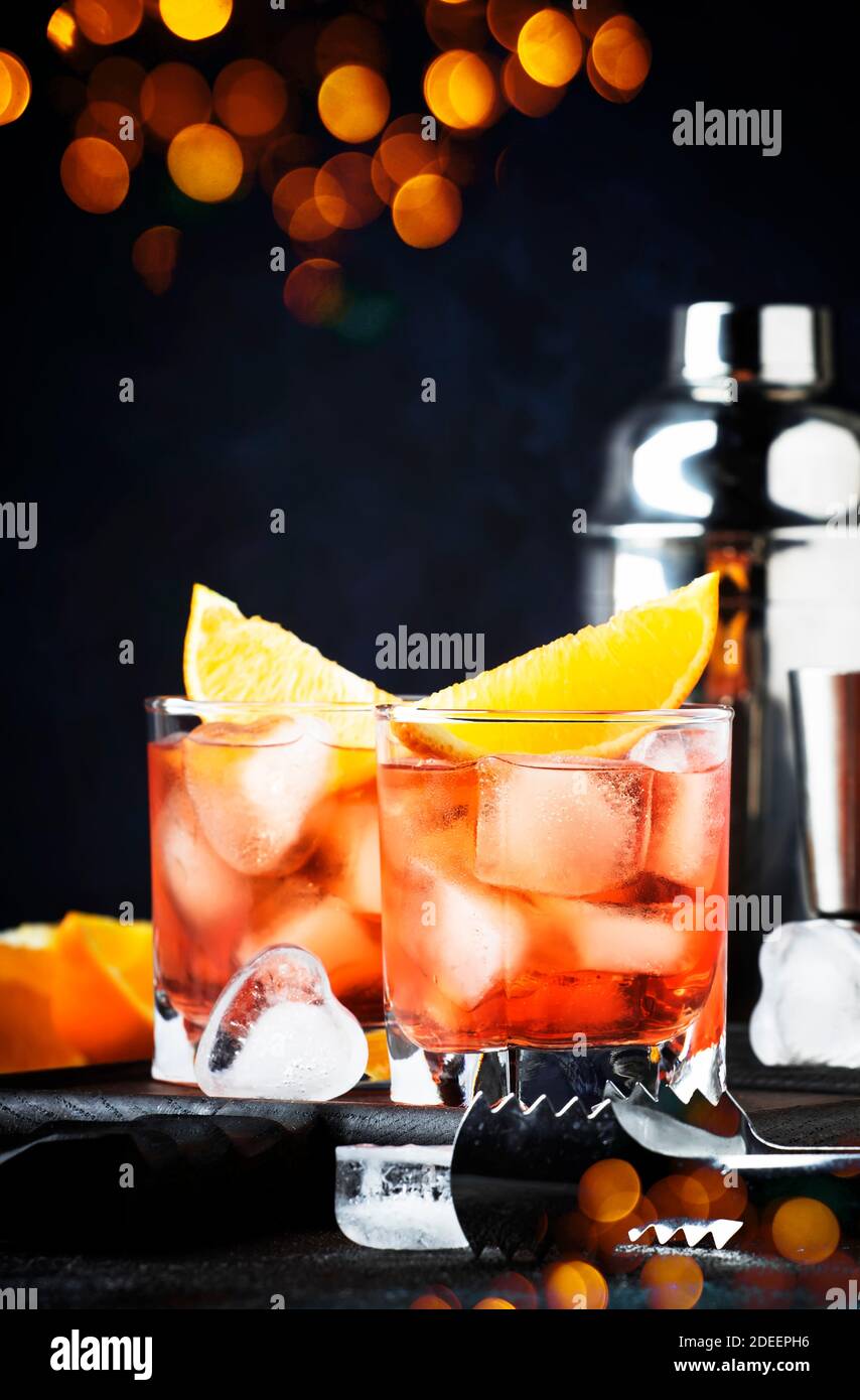 Trendy alcoholic cocktail Negroni with dry gin, red vermouth and red