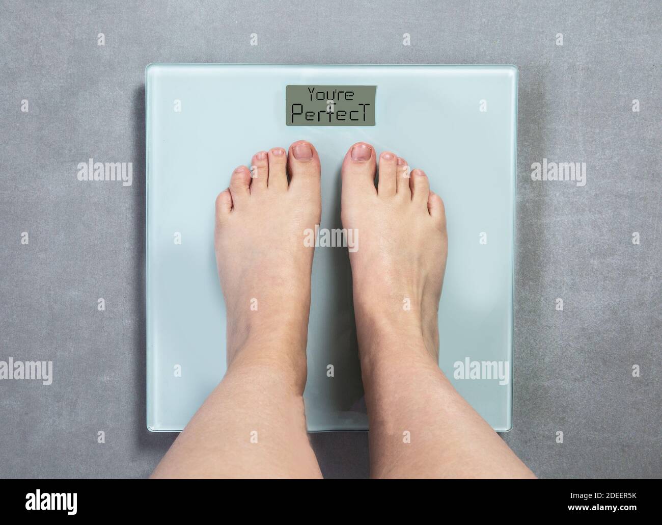 Human Foot On Weighing Scale Stock Photo - Alamy
