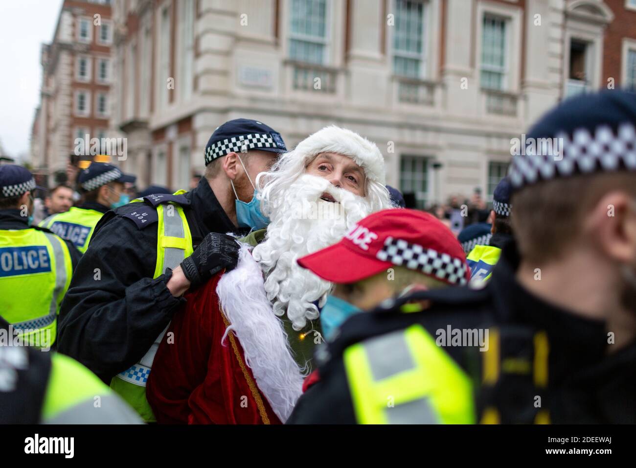 Antilockdown protest, London, 28 November 2020. A protester dressed as