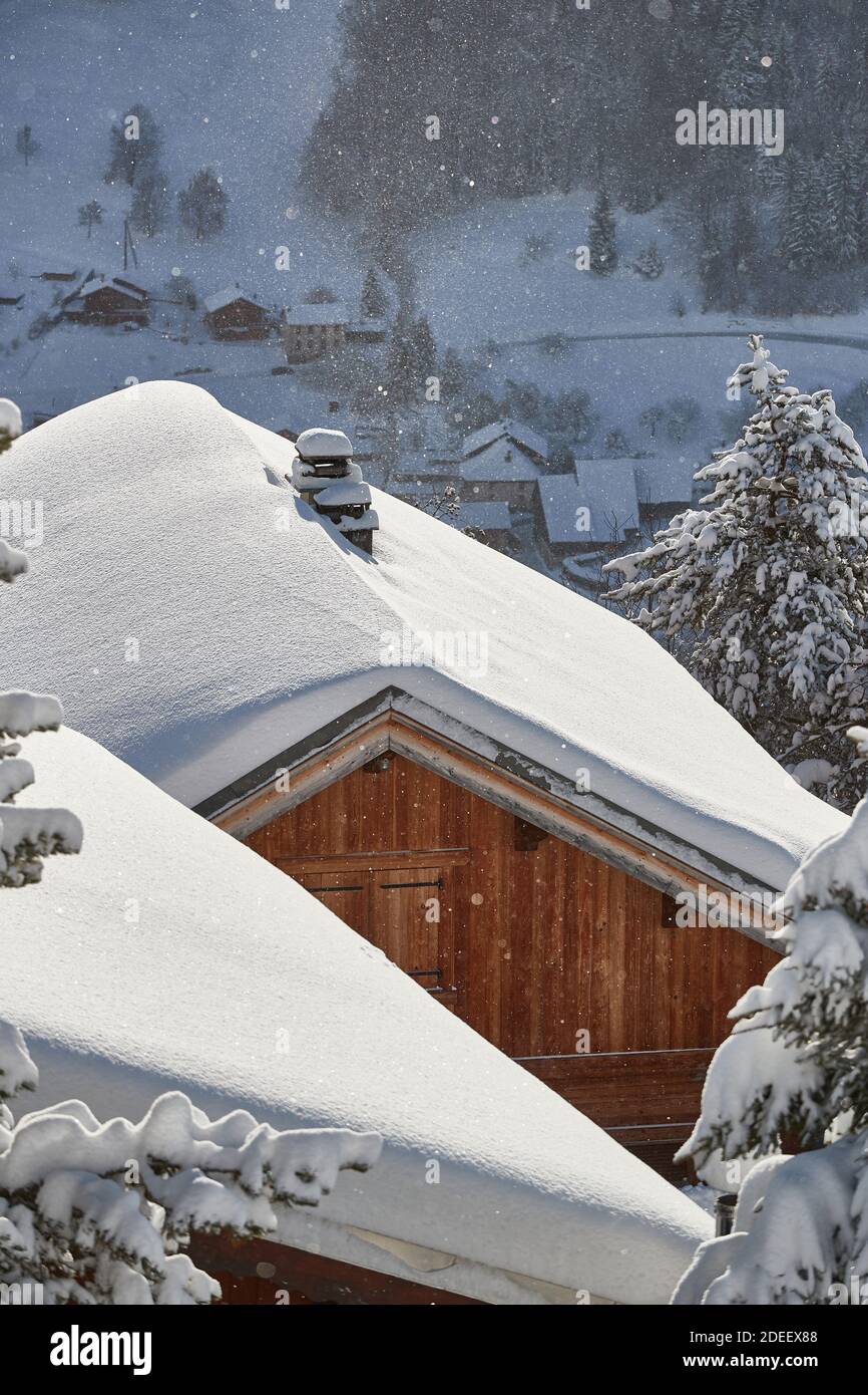 Winter mountain village, roof and chimney covered with snow Stock Photo ...