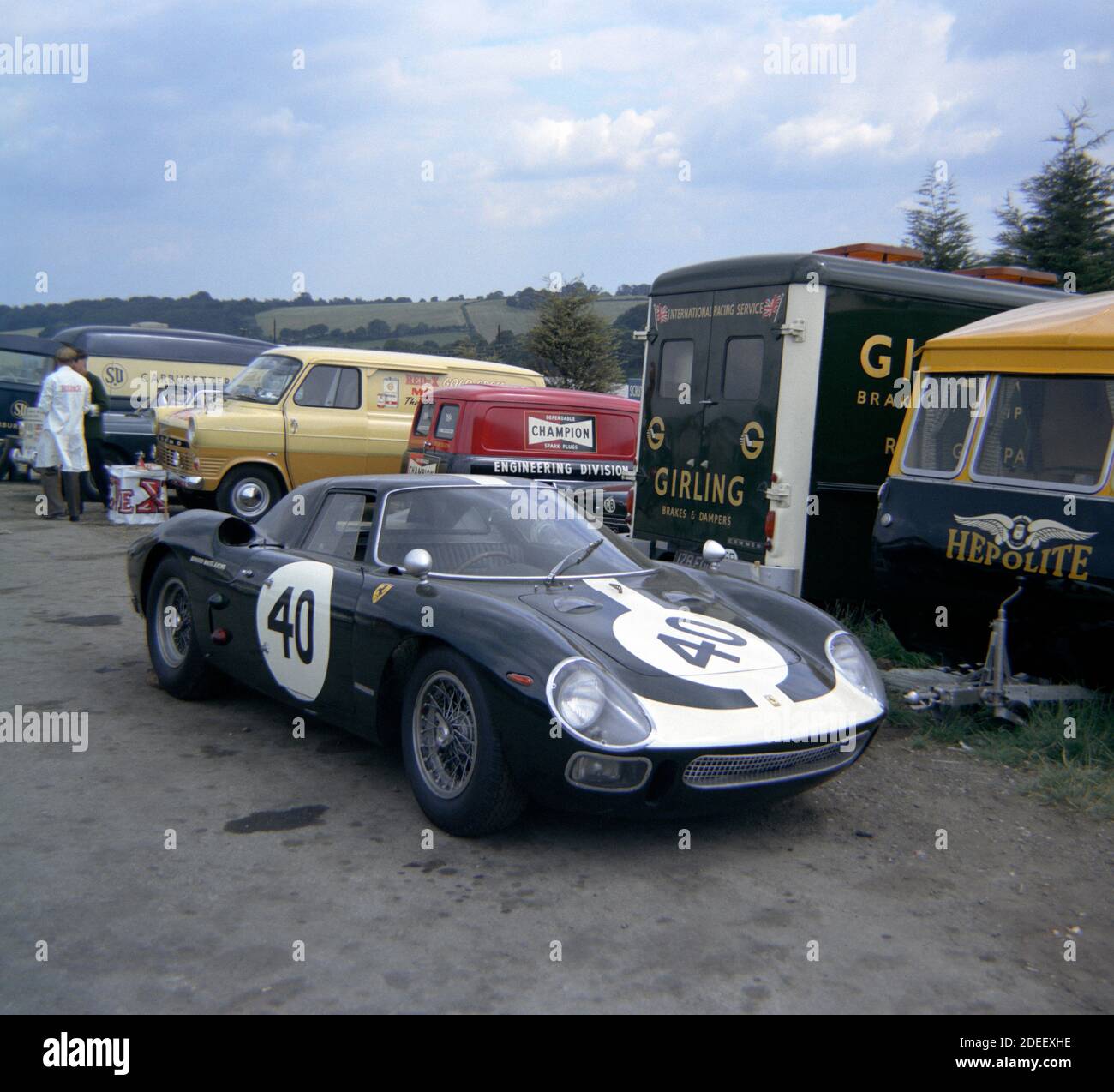 Ferrari 250LM car in paddock at Brands Hatch Practice for the Guards Trophy for sports-racing cars at 1966 British Grand Prix, 15 July. Driver D.Hobbs Stock Photo