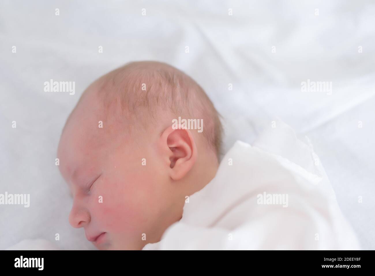 Detail of newborn baby ear Stock Photo