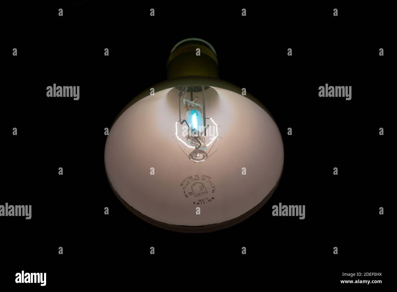 Philips MLR 160 lamp, a 160W self ballasted high pressure mercury lamp that can run from mains without auxiliary control gear - filament and arc tube Stock Photo