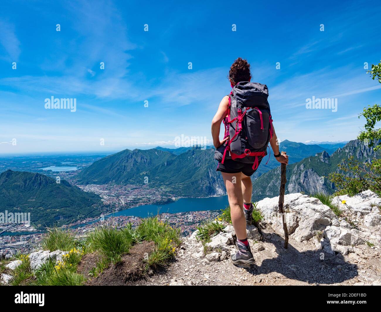 Female hiker on lake como alps Stock Photo - Alamy