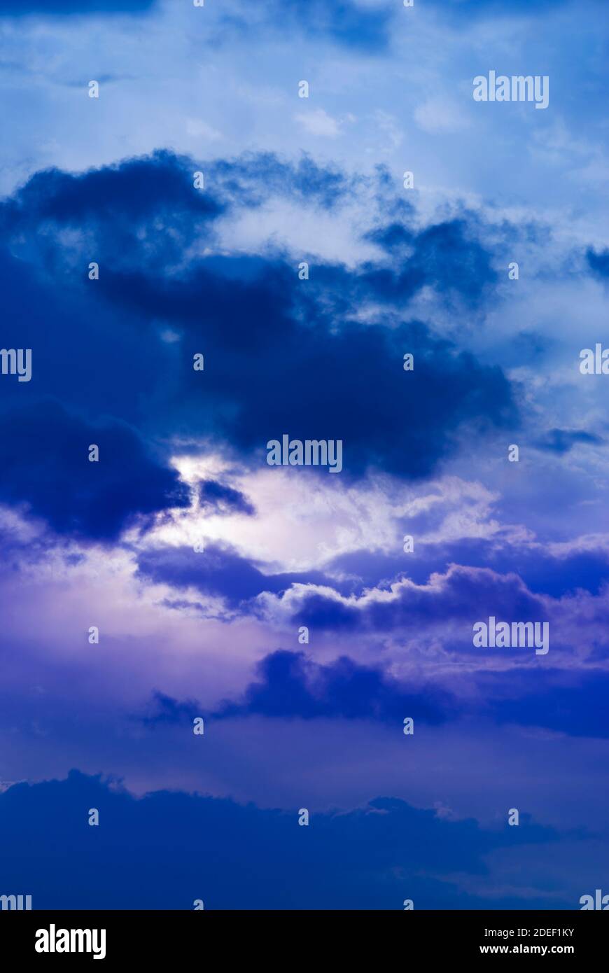 Night Blue Sky And Moonlight Background The Magic Moon Shines In The Night Sky Through Dark Blue Clouds Stock Photo Alamy