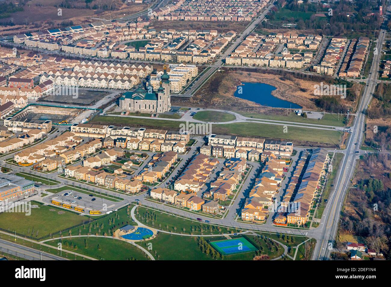 New subdivision neighbourhood in Markham surrounding the Cathedral of the Transfiguration. Stock Photo