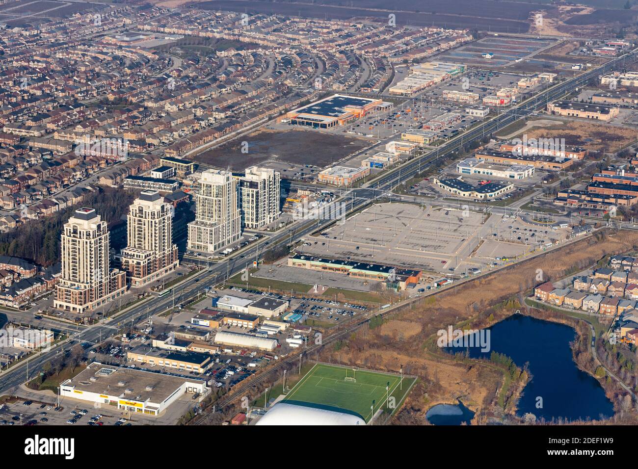 An aerial view north of 16th Ave on Markham Rd showing Mt Joy Go Station, residential and commercial developments. Stock Photo