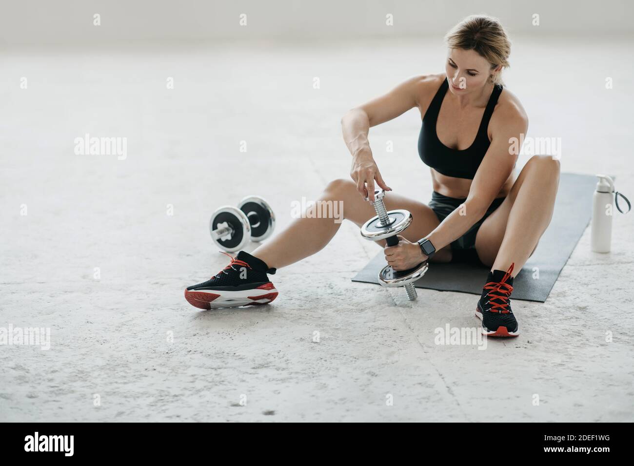 Sports at home during quarantine and strength training Stock Photo