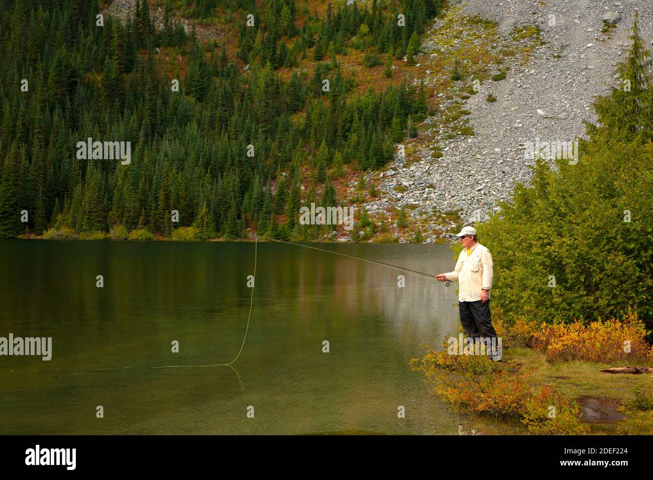 Fly fishing Lake Louise, Mt Rainier National Park, Washington Stock