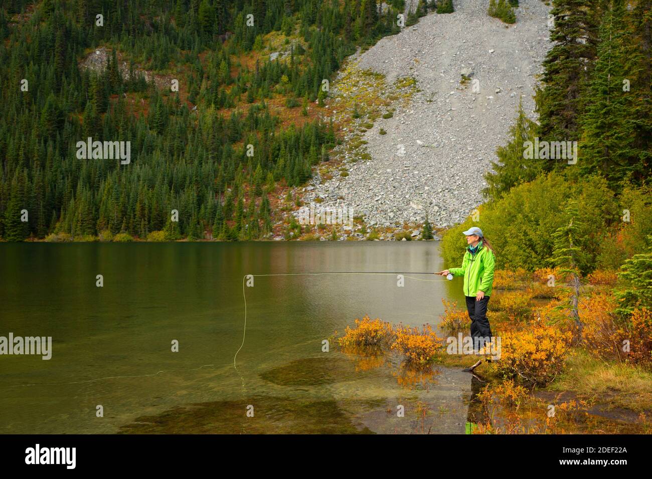 Fly fishing Lake Louise, Mt Rainier National Park, Washington Stock