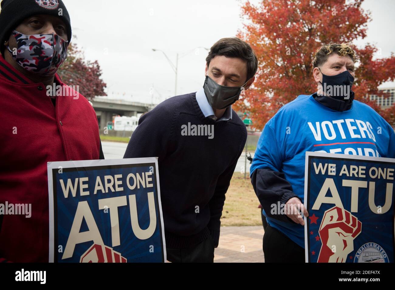 Atlanta, GA, USA. 30th Nov, 2020. JON OSSOFF, democratic candidate for one of two Georgia seats in the U.S. Senate in January 2021 runoff election, meets with members of several unions at a press conference Monday outside a union meeting hall. Ossoff said he questioned Sen. David PerdueÃs explanations about the senatorÃs investments in medical supply companies following information briefing about the Covid-19 virus earlier this year. A debate between the two candidates was scheduled for next weekend, but Sen. Perdue has declined to participate.Pictured (Credit Image: © Robin Rayne/ZUMA Stock Photo