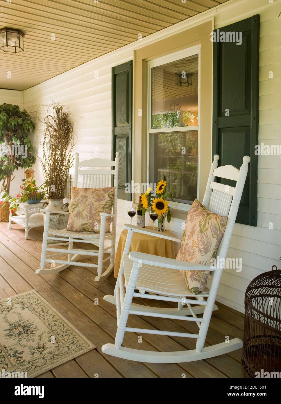 Rockers on front porch Stock Photo - Alamy