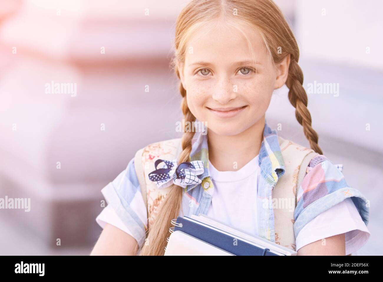 Beautiful American Portrait Of Schoolgirl Preschool Kid Holding Book beautiful-american-portrait-of-schoolgirl-preschool-kid-holding-book