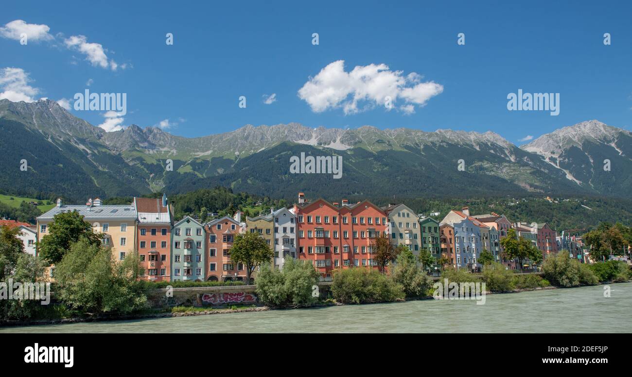 Innsbruck colorful houses on the Inn river with bicycles Stock Photo
