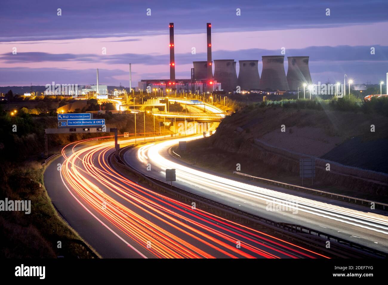 Light trials on the A1(M) in front of Ferrybridge power station just after cooling tower 6 had been demolished and before a further 3 were demolished Stock Photo